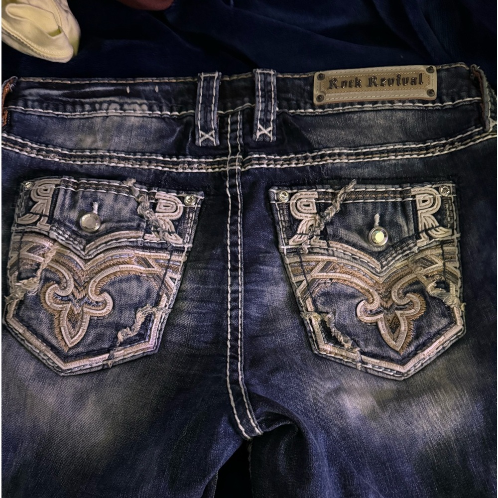 Rock Revival Delu mid-rise straight leg jeans.